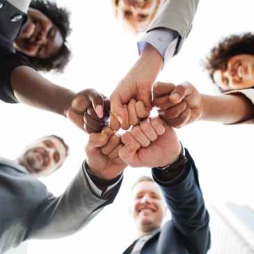 Image of people coming together to represent equality and diversity in the workplace